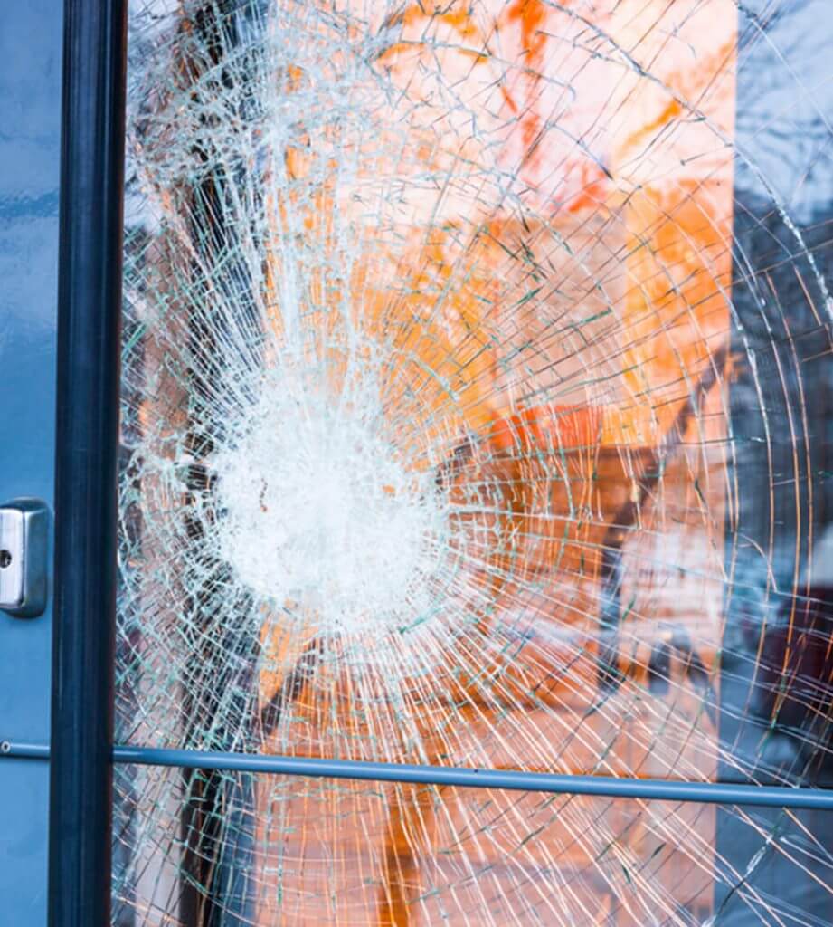 Broken Glass In A Glass Door